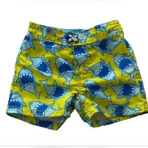 New OshKosh B'Gosh shark-pattern swim trunks, size 9 months